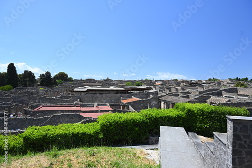 Fototapeta Naklejka Na Ścianę i Meble -  Historic streets of Ancient  roman city of Pompeii Italy on the shadow of Mt Vesuvius.Roman world, UNESCO World Heritage Site, Pompeii Archaeological Park. Italy