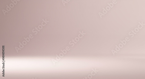 Minimalist pink gradient studio background for product presentation or display purposes