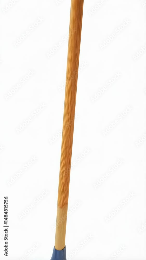 Close-up of straw broom with wooden handle and blue accents on a white background for cleaning chores, household. Close-up of straw broom with wooden handle and blue accents on a white background for cleaning chores, household.