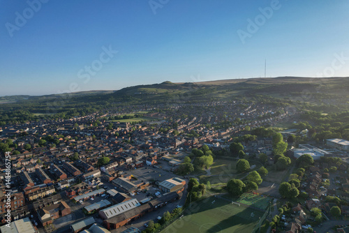 Aerial view of Horwich village in Bolton UK with Rivington Pike in the background.