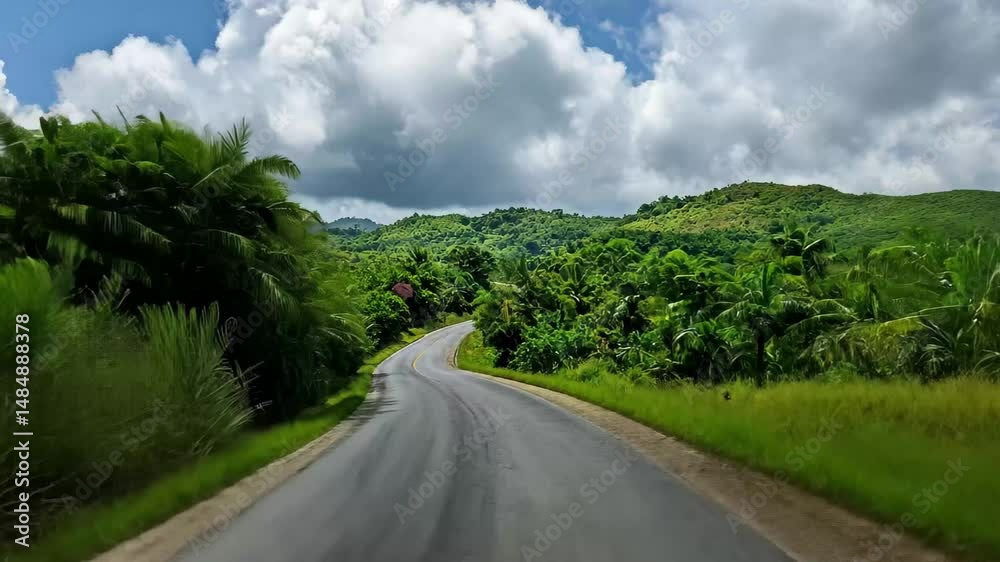 Country road winding through lush greenery under a cloudy blue sky in a peaceful rural setting, Country road with lush greenery under cloudy blue sky Country road winding through lush greenery under a cloudy blue sky in a peaceful rural setting, Country road with lush greenery under cloudy blue sky