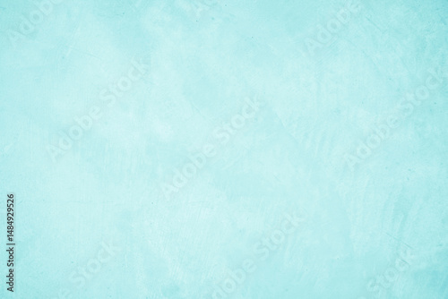 Pastel blue and white concrete stone texture for background in summer wallpaper. Cement and sand wall of tone vintage. Concrete abstract wall of light cyan color, cement texture mint green for design.