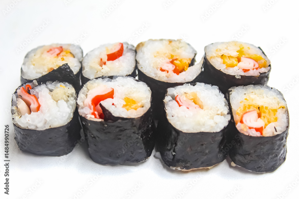 a bunch of sushi isolated on a white background a bunch of sushi isolated on a white background