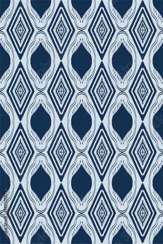 Abstract navy and white ethnic motif Ikat-inspired geometric pattern with diamond and organic shapes wallpaper textiles background.  Ideal for modern boho, ethnic, fashion prints etc.,