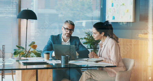 Photos Documents, laptop and business people in office with discussion for company investment deal
