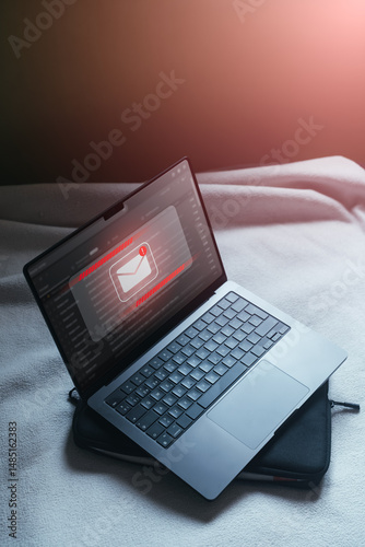 Cyber security on internet concept. Email spam notification alert with warning caution on laptop scree. Compromised information.