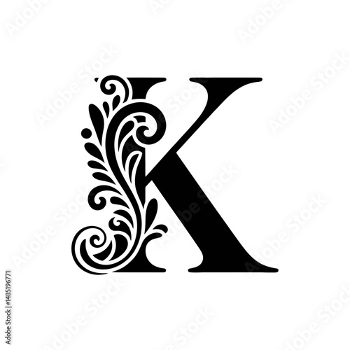 An ornate letter K is adorned with intricate floral patterns, giving it an elegant and sophisticated appearance.