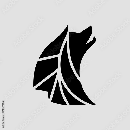 Bold tribal wolf head design, perfect for tattoo or logo.