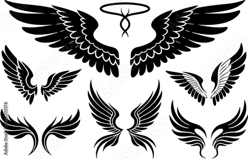 Collection of various stylized angel wings for graphic design.