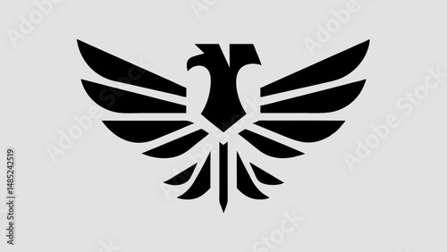 Stylized black eagle with spread wings on a light gray background in a simple flat vector design