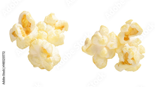 Close up of fluffy and light popcorn kernels isolated against a solid black background in high detail on transparent background