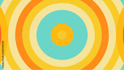 Concentric circles in shades of yellow orange and turquoise creating a retro style abstract design