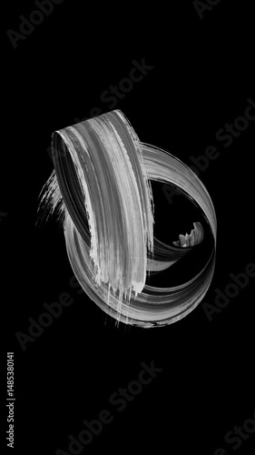 Vertical creative 3D animation. Animated black and white smear. Monochrome brush stroke moves in a spontaneous curvy trajectory on black background. Abstract shape drawn with paint