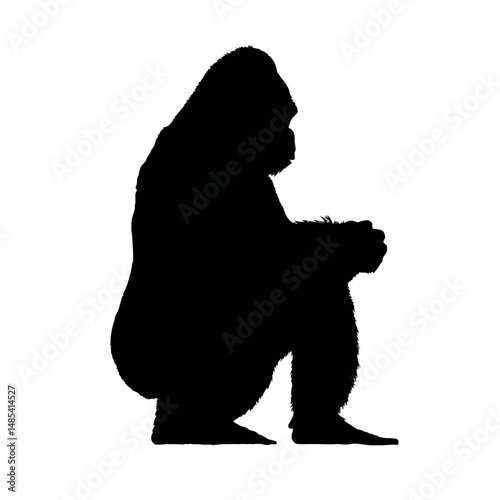 Solid black silhouette of a gorilla sitting