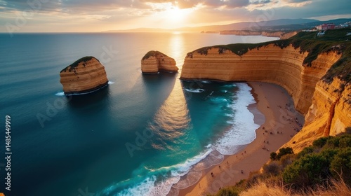 Aiguablava Cove glowing under dawn sunlight, viewed from above with vivid waters.