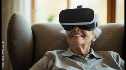 Golden age retirement senior person using virtual reality VR headset technology concept immersive experience joy happiness at home lifestyle active aging well being