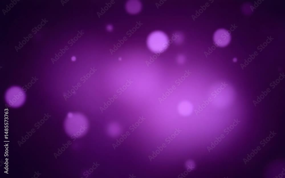 Blurred purple abstract background of bokeh and small round particles of energy magical holiday flying dots on a black background
