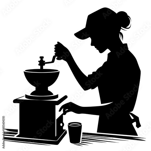 Person grinding coffee at table