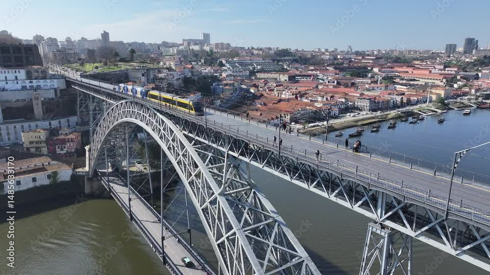 Luis I Bridge At Porto In Porto District Portugal. Downtown Cityscape. Railway Bridge. Railroad Scenery. Luis I Bridge At Porto In Portugal. Tourism Landmark. Luis I Bridge At Porto In Porto District Portugal. Downtown Cityscape. Railway Bridge. Railroad Scenery. Luis I Bridge At Porto In Portugal. Tourism Landmark.