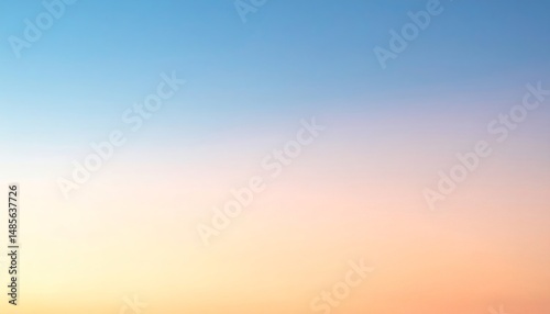 Colorful sky background showing a gradient from blue to orange at sunset