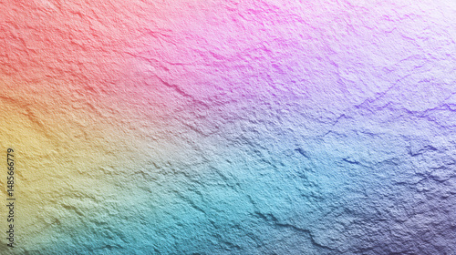 Colorful gradient texture with soft hues and subtle patterns on a surface