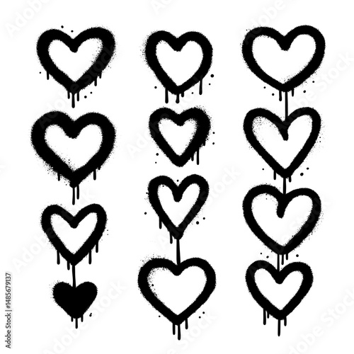 Grunge graffiti hearts icons set. Urban airbrush scribble ink heart shapes icons drawn with spray paint. Textured vector illustration.