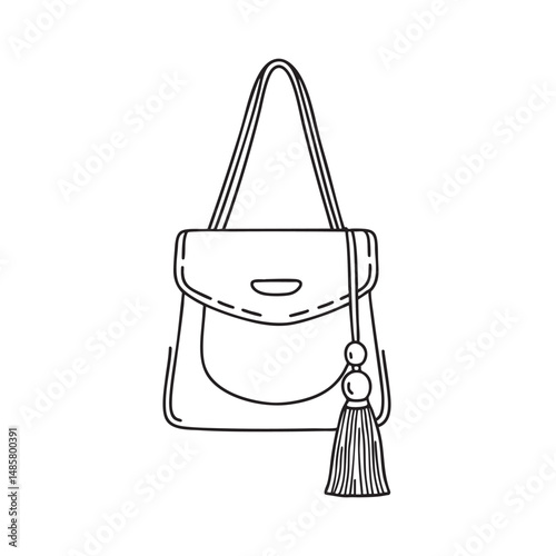 A tassel hanging from a hand bag 