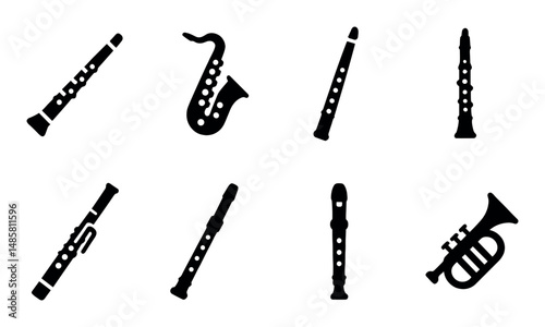 Set of eight musical instrument silhouettes: woodwinds and brass