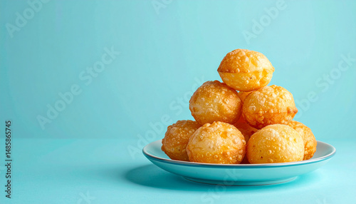 Pani Puri Indian Street Food Isolated on Light Blue Background with Minimal Design photo