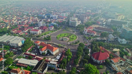 Drone view of tugu muda monument. aerial view of tugumuda roundabout in semarang city photo