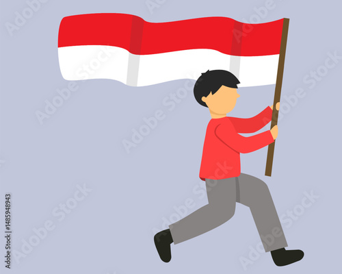 Boy holding up the red and white flag of Indonesia. waving flag. 