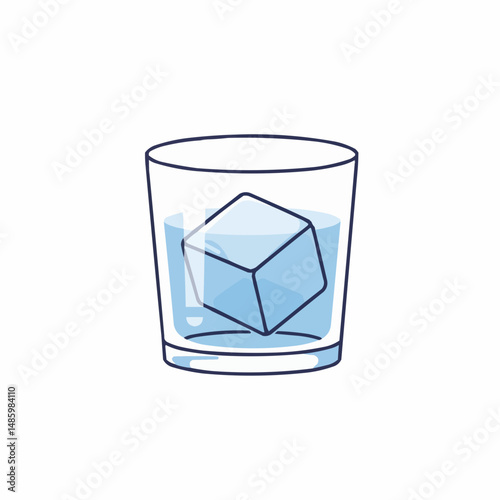 An ice cube floats in a glass filled with water, set against a white backdrop