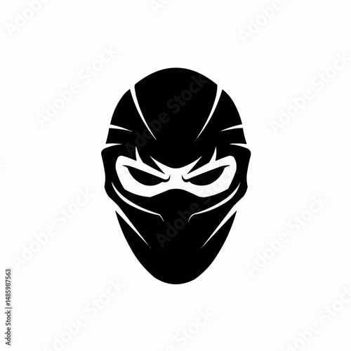 Stylized dark face, intense gaze, partial view. Menacing creature symbol