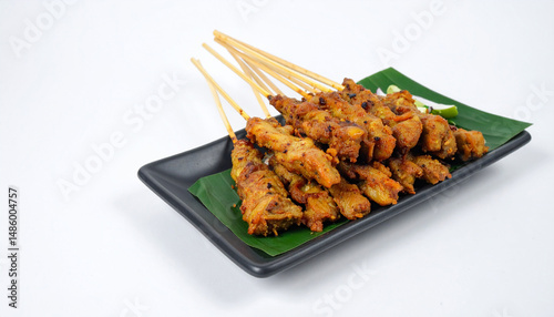 Indonesian Traditional Satay Skewers Isolated on White Background – Authentic Street Food photo