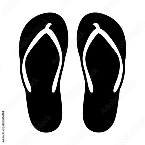A pair of black flip flops on a white background. Summer footwear.