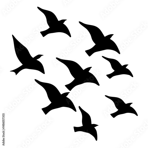 Silhouette of birds flying in formation creating a sense of freedom and harmony