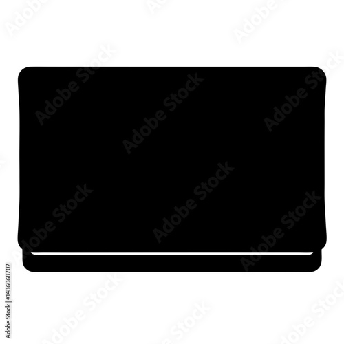 Black rectangular device with rounded corners, placed on a flat surface