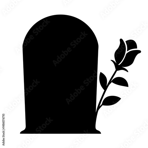 Grave marker or tombstone with a single rose representing death and remembrance