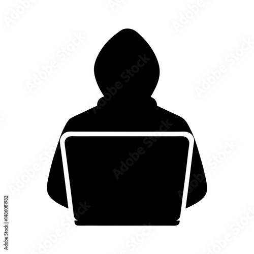 Silhouette of hooded figure using a laptop, symbolizing cybercrime activity