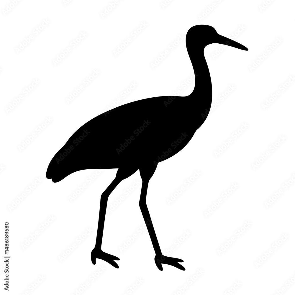 Fototapeta premium Striking Silhouette of a Wading Bird Stands Tall in Black and White