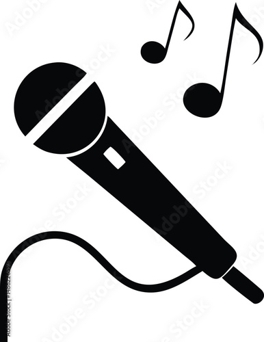 Black microphone with a cable is placed below a musical note design