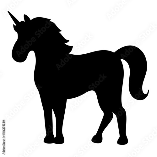 Silhouette of a majestic unicorn standing tall in the darkness of night