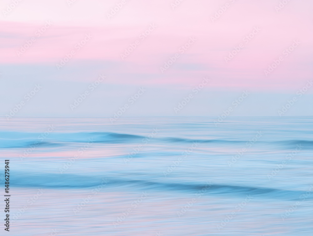 Obraz premium Serene Landscape of Gentle Waves Under Soft Pink and Blue Sky at Dusk with Calm Waters Reflecting Tranquility of Nature in Beautiful Setting