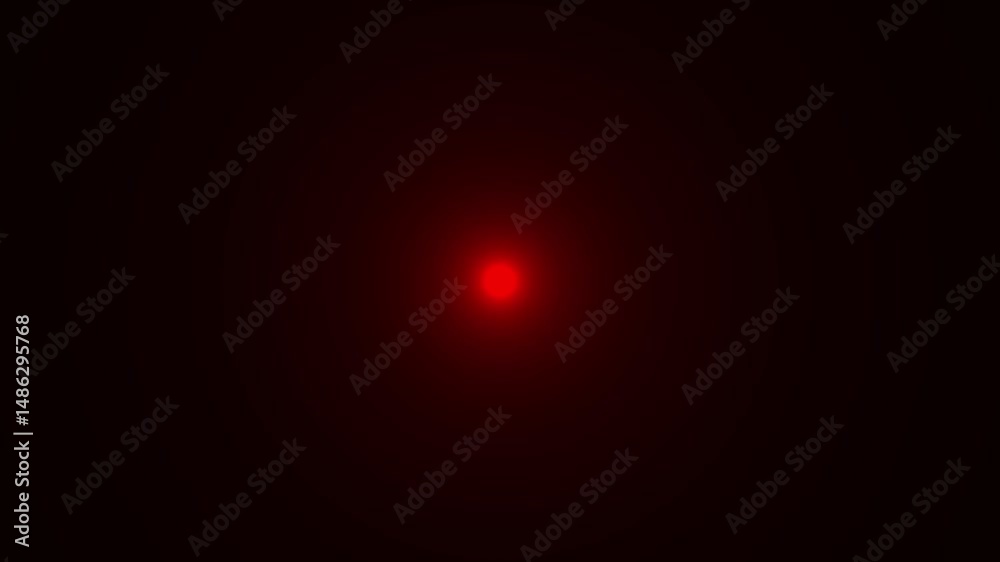 Bright red light in a dark space abstract visual concept