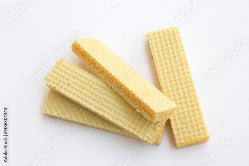 Tasty Cheese Wafer biscuits isolated on a white background.