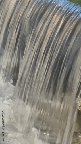 Waterfall with a lot of water coming out of it