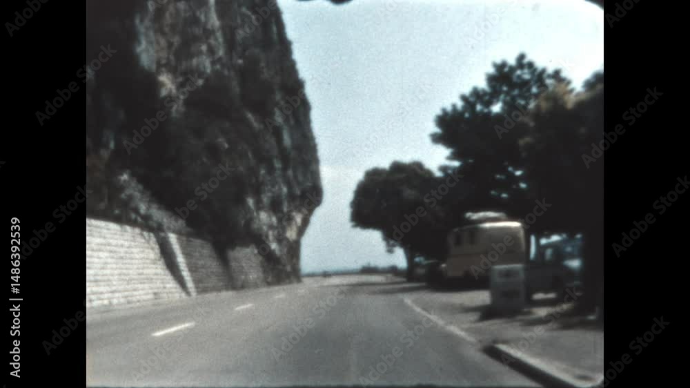Strada Costeria 1964 - First person view from a car as it drives south on the Strada Costeria, the coastal road on the Bay of Trieste, Italy in 1964. 