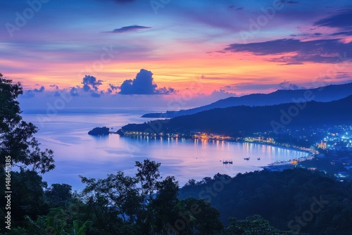 Stunning twilight view of Phuket island coastline with vibrant skies and sparkling water, Asia coast at twilight Phuket island famous viewpoint