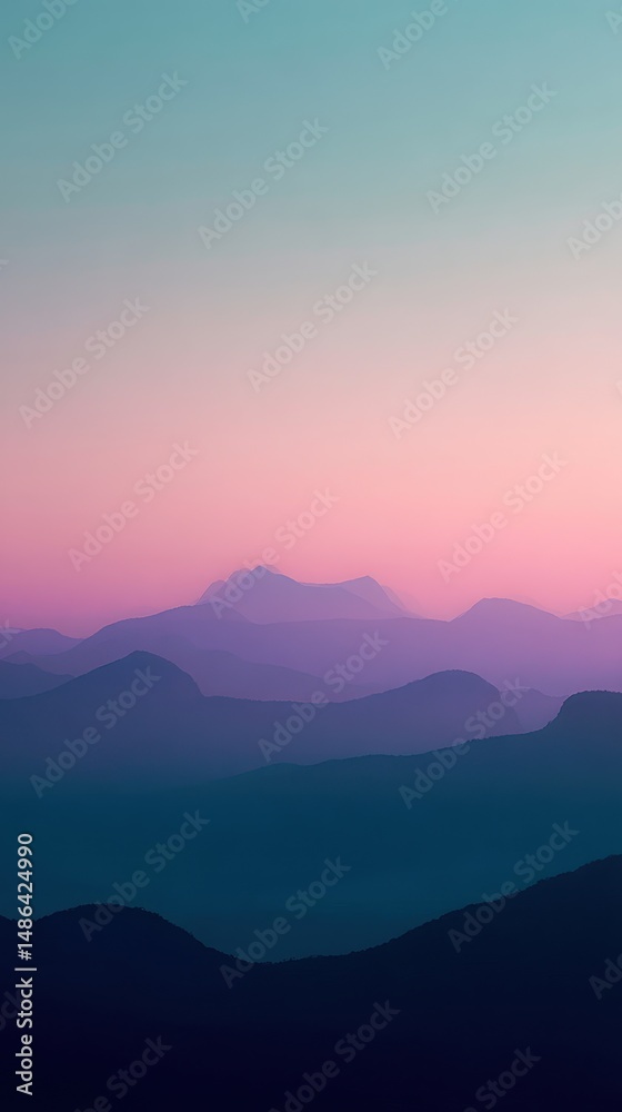 Obraz premium Serene Sunset Over Mountain Ranges with Soft Hues of Pink, Purple, and Blue in Calm Atmosphere for Nature and Landscape Photography