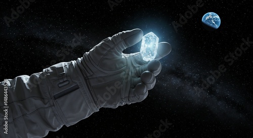 Astronaut holding a diamond in space with stars in the background  